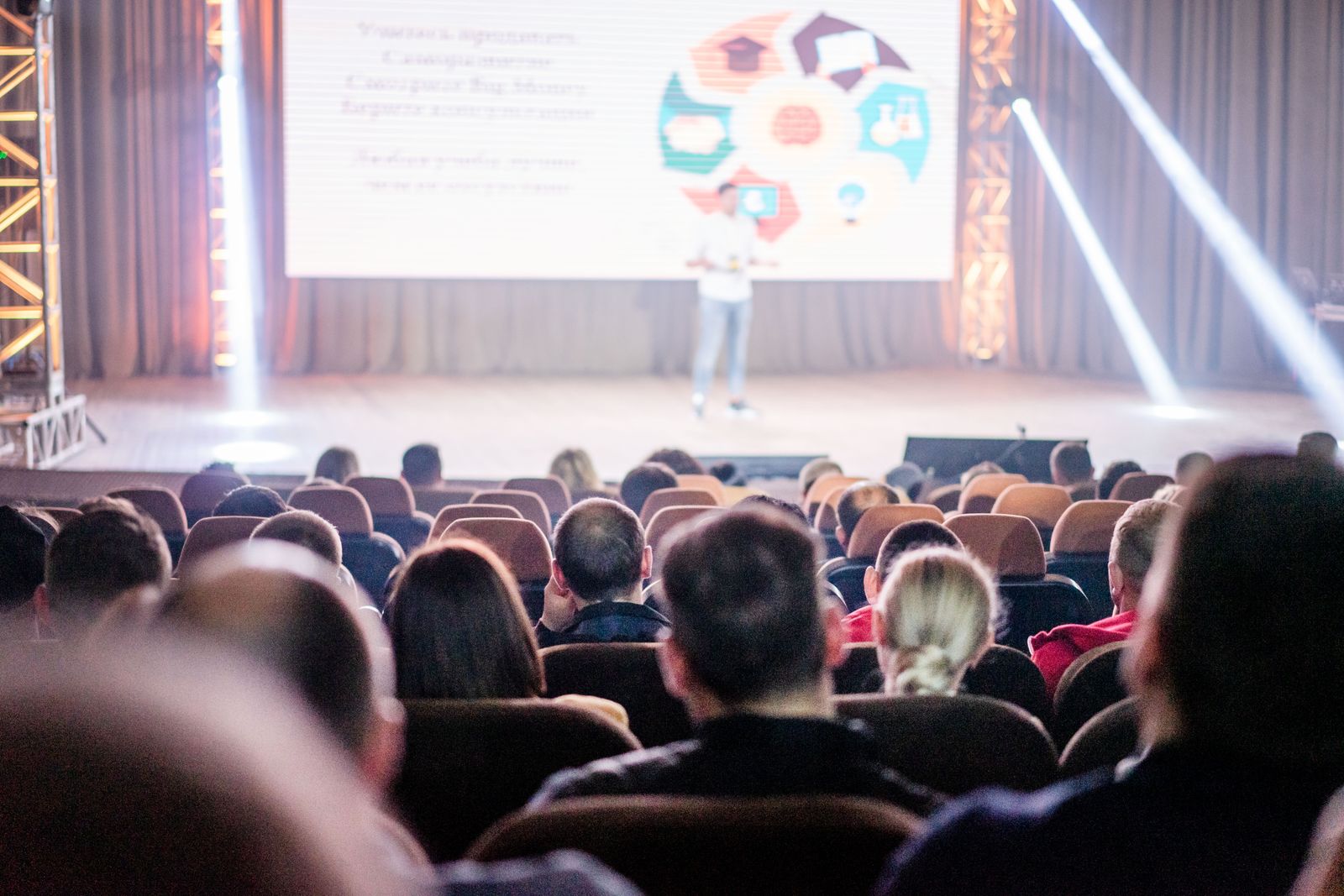 Audience listening to a presentation